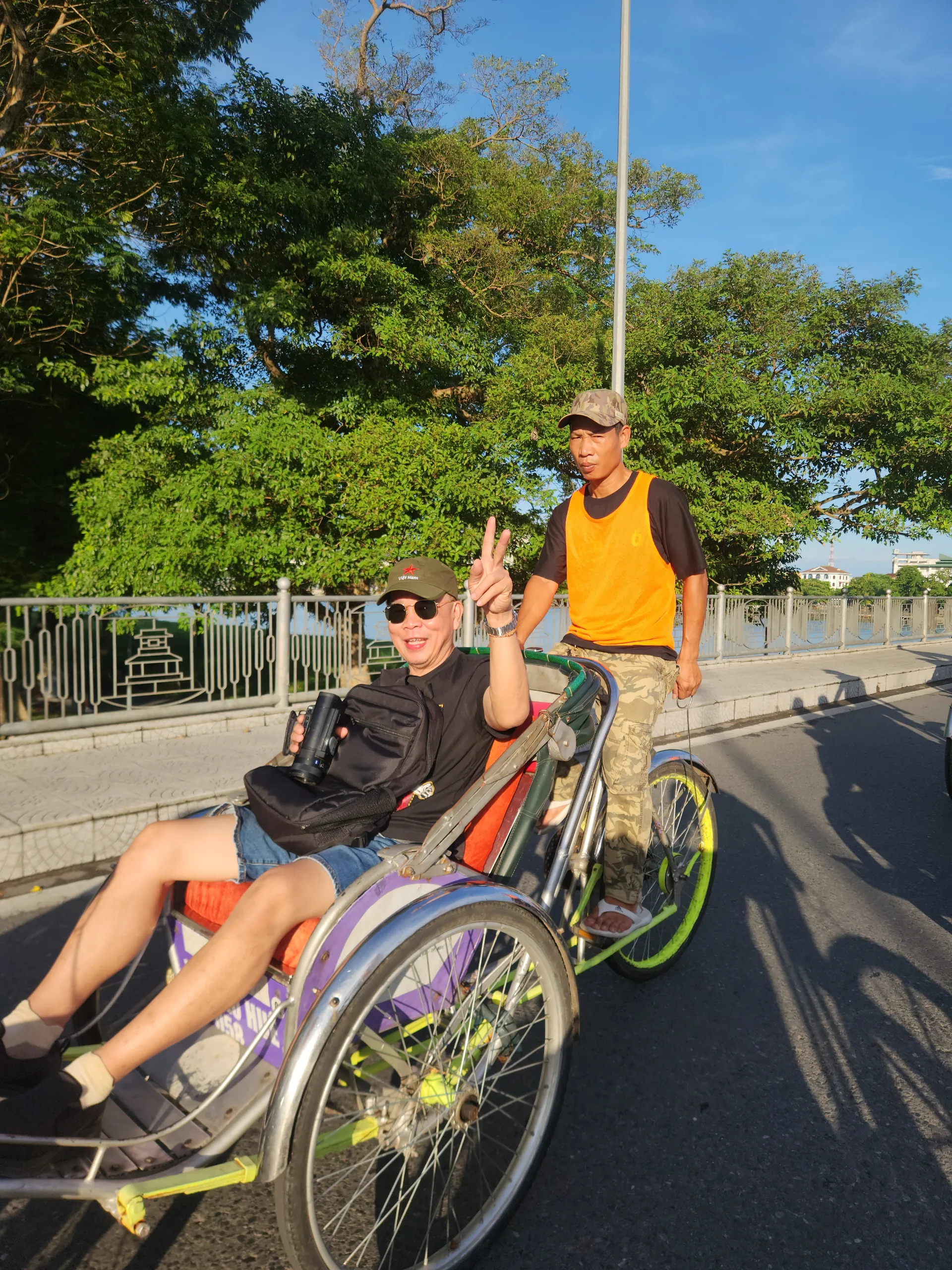 Cyclo ride in Hue city along the Perfume River