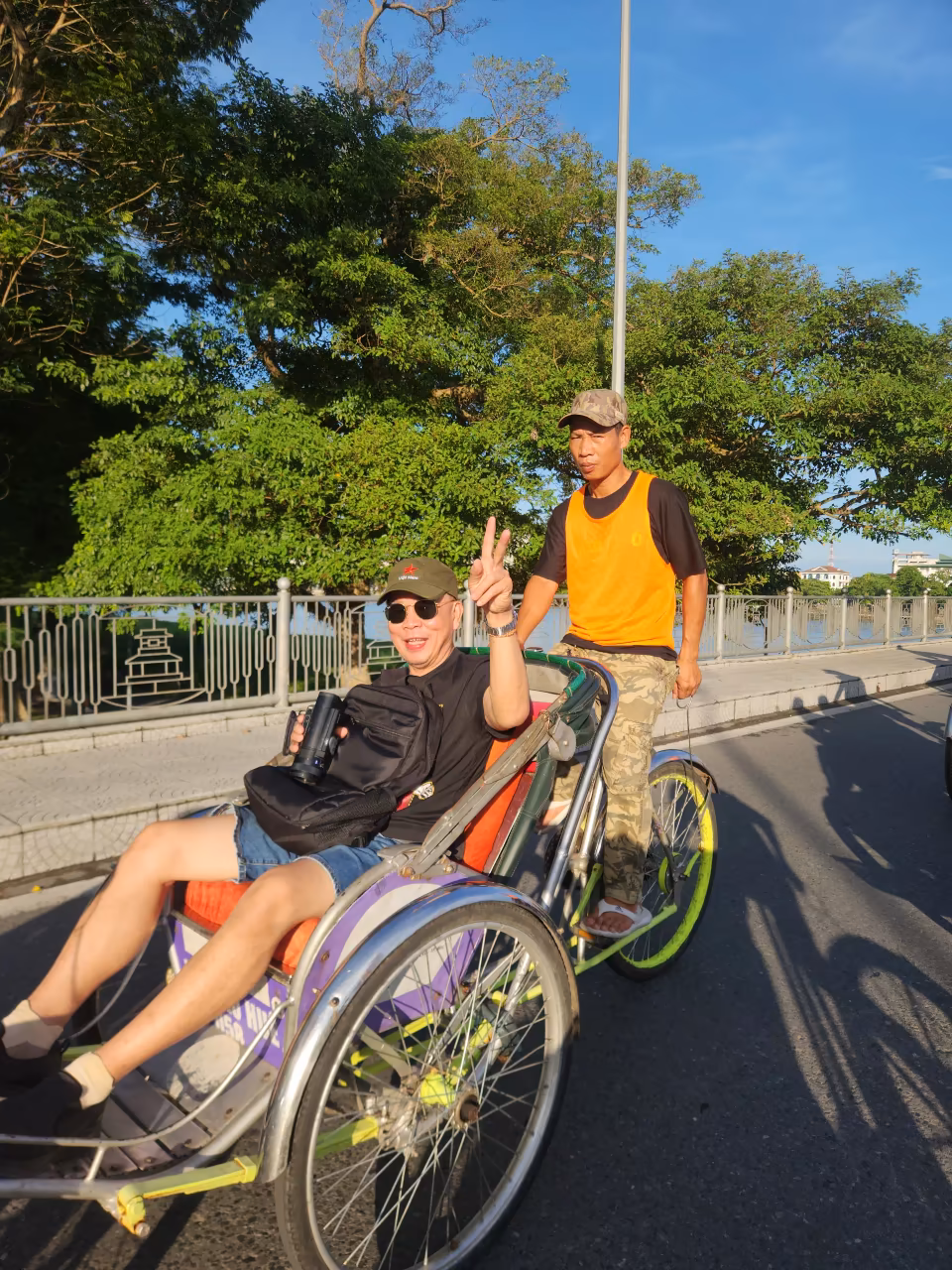 Cyclo ride in Hue city along the Perfume River