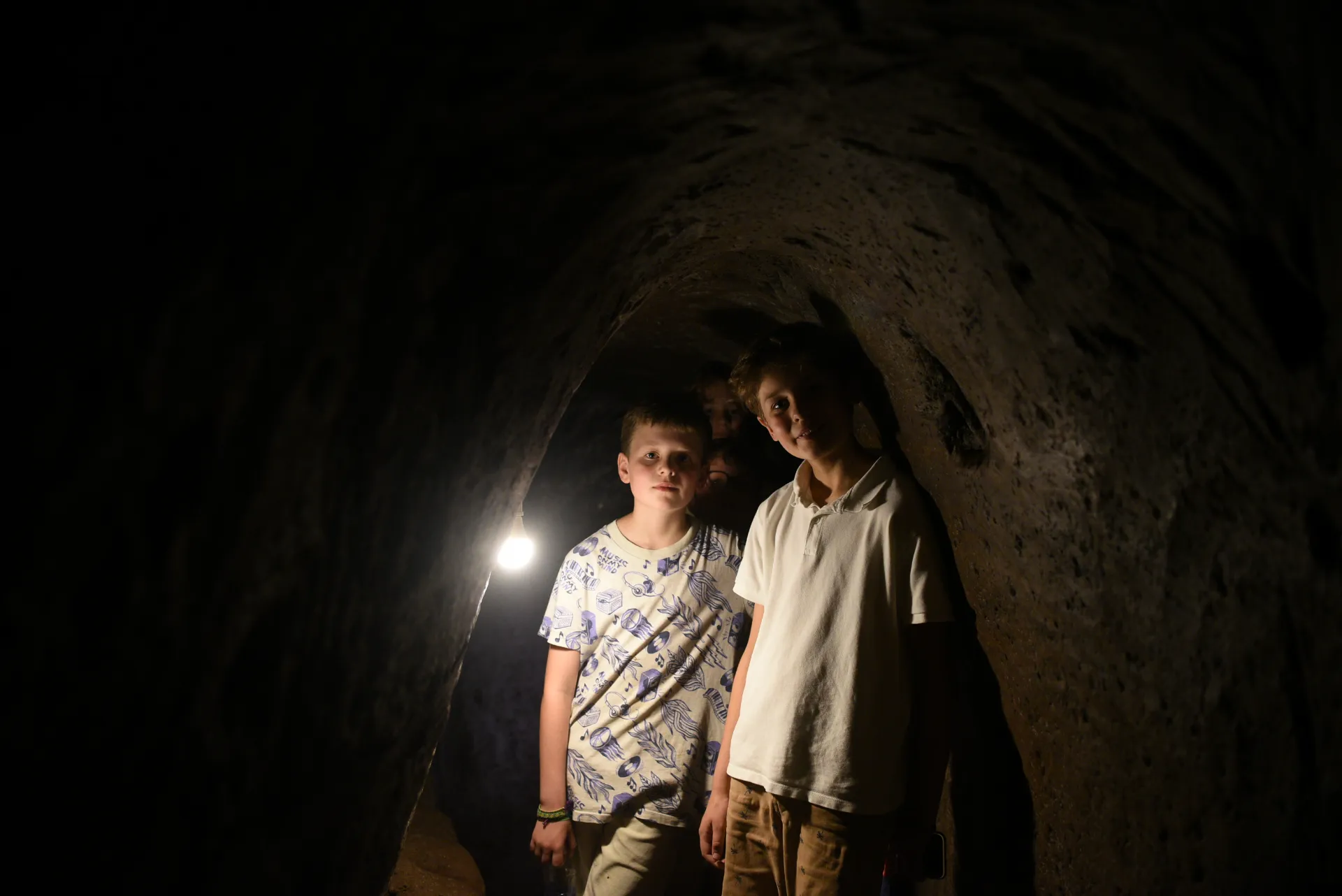 Tourists exploring Vinh Moc Tunnels, Vietnam DMZ